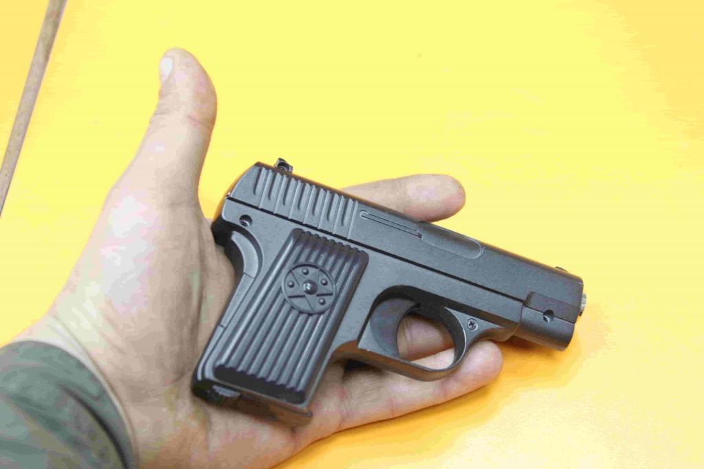 Минитюрный спринговый пистолет изображение